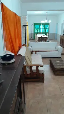a living room with a couch and a table at Casa amplia en las sierras de San Luis in San Francisco del Monte de Oro