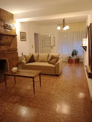 a living room with a couch and a coffee table at Being in Cordoba