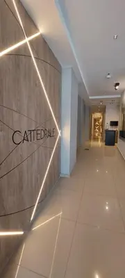 a hallway of a building with a sign on the wall at Excelente departamente nuevo! in Cordoba