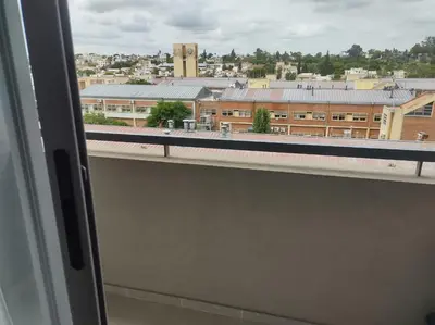 a view of a city from a window of a train at Hermoso Departamento confort y calidad in Cordoba