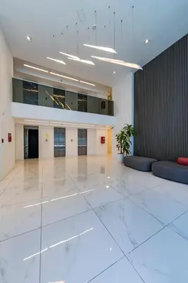 an empty lobby of a building with a large hall at La Diva de Gama in Cordoba