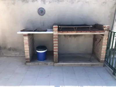 a table with some food on top of it at Casa de Beto Estancia Vieja in Estancia Vieja