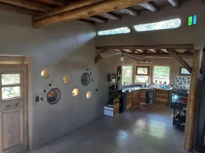 a large room with a kitchen and a living room at Hermosa casa amplia y luminosa in Villa Los Aromos