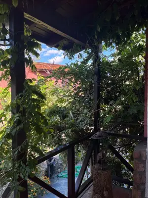 a view from the porch of a house with a pool at MIRADOR DE ESTRELLAS RESORT in Nono