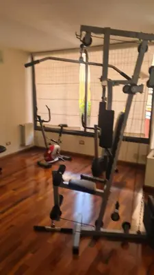 a room with a gym with two exercise bikes at Escaparte nunca se sintió tan bien, este es tu rincón para disfrutar in Villa Carlos Paz