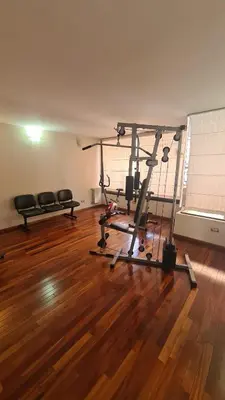 an empty room with a gym with two tread machines at Escaparte nunca se sintió tan bien, este es tu rincón para disfrutar in Villa Carlos Paz