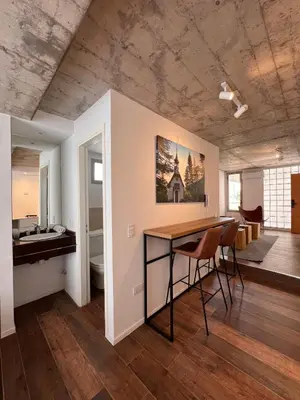 a kitchen and dining room with a table and chairs at Departamentos en Barrio Gral Paz a pocos metros de clínicas in Cordoba