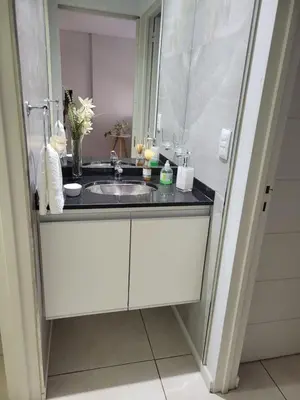 a bathroom with a sink and a shower at Departamento Nueva Cordoba in Cordoba