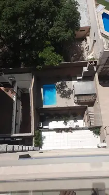 an aerial view of a house with a pool at Departamento Nueva Cordoba in Cordoba