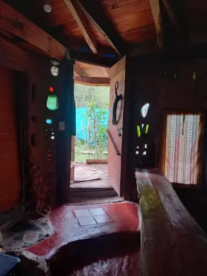 an empty room with a door with stained glass at EcoCasa in Cordoba