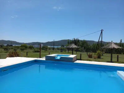 a swimming pool in a villa with a view at Remanso Los Molinos in Potrero de Garay