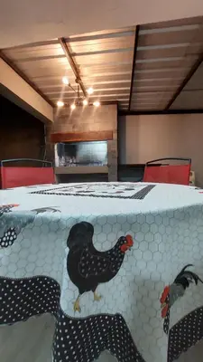 a table with a chicken on it in a room at Casa de Descanso Valle Escondido in Cordoba