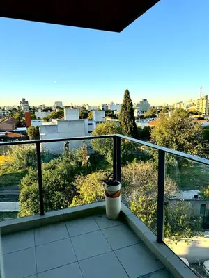 a balcony with a view of a city at Departamento Altas in Cordoba