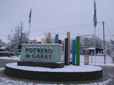 a sign for a potrero de garry in the snow at Jasy Cabañas in Potrero de Garay