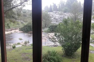 a view of a river from a window at HOSTERÍA ARROYO CRISTAL in Cavalango