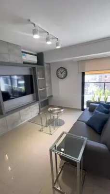 a living room with a couch and a table at Dpto Obispo Trejo - Nueva Cba - Alquiler mínimo por 3 meses in Cordoba