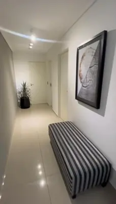a room with a couch and a picture on the wall at Dpto Obispo Trejo - Nueva Cba - Alquiler mínimo por 3 meses in Cordoba