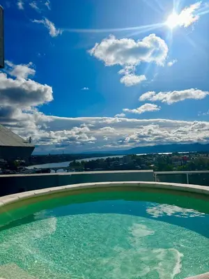 a swimming pool on top of a building at Depto 