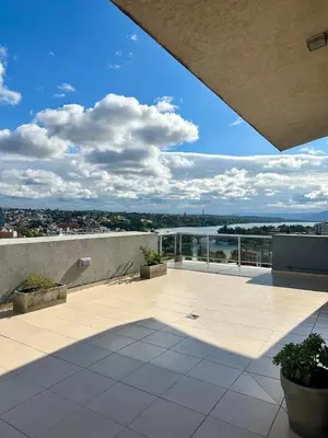 a balcony of a building with a view of the city at Depto 