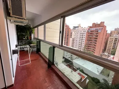 a balcony with a view of a city at Depto Nva Cba mts Parque Sarmiento in Cordoba