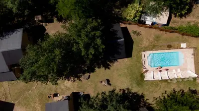 an overhead view of a swimming pool in a yard at Rancho Pampa in Villa Ciudad Parque