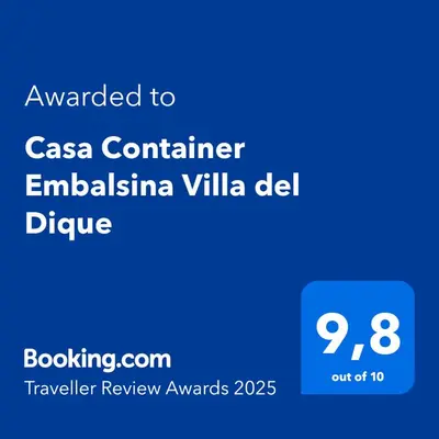 a screenshot of a cell phone with the text awarded to casa container emilia at Casa Container Embalsina Villa del Dique in Villa del Dique