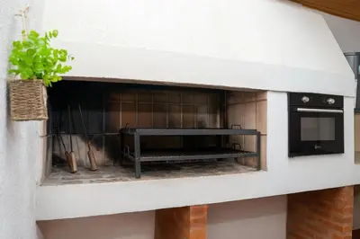 a model of a fireplace in a house at Atenea Residence in Cordoba