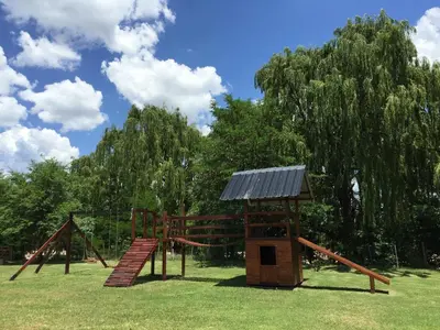 a park with a playground with a play structure at Casonas de Nono in Nono