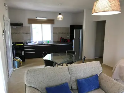 a living room with a couch and a glass table at Casonas de Nono in Nono