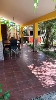a patio with a table and chairs on it at Complejo La Tere- depto 1 in Cordoba