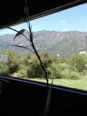 a window with a view of a mountain at Cabaña Los Espinillos in Cortaderas