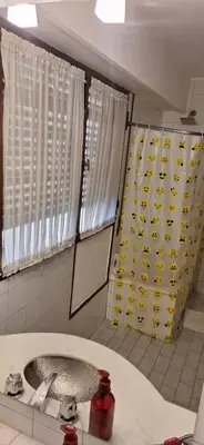 a bathroom with a sink and a mirror at cordoba departamentos por dia cañada in Cordoba