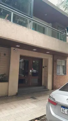 a car parked in front of a building at Tejas in Cordoba