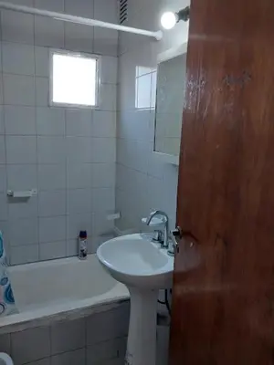 a bathroom with a sink and a bath tub at Nueva Córdoba Argentina externo luminoso in Cordoba