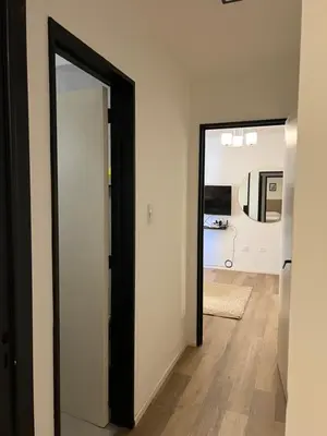 a hallway with a door leading into a room at Departamento confortable centro Wi Fi - cochera opcional in Cordoba