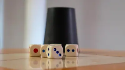 a group of dice sitting on top of a table at Nuevo Hotel Carmel in Villa Carlos Paz