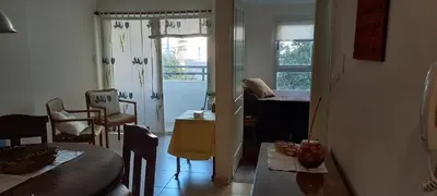 a kitchen with a table and a dining room at Bedoya in Cordoba