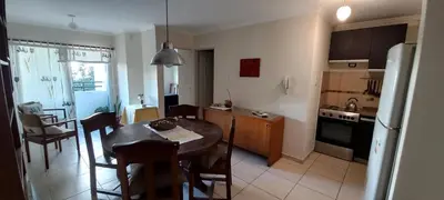a kitchen and dining room with a table and chairs at Bedoya in Cordoba