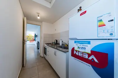 a kitchen with a nasa sign on the wall at ALTOS DE COLON in Cordoba