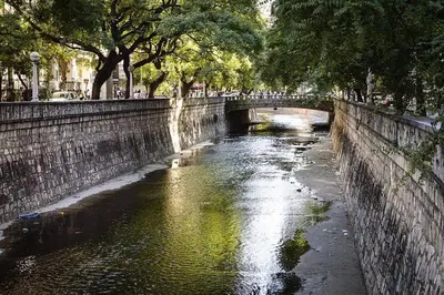 a bridge over a river in a city at Adri in Cordoba