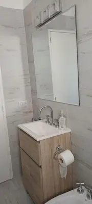 a bathroom with a sink and a mirror at Adri in Cordoba