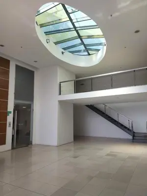 a large empty room with a skylight in a building at Buenas vistas apartment in Cordoba