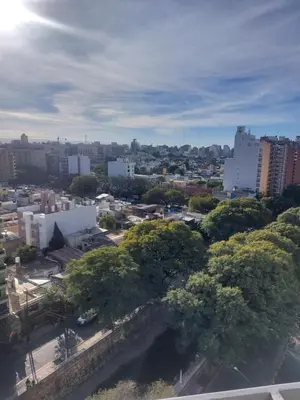 a view of a city with trees and buildings at Buenas vistas apartment in Cordoba