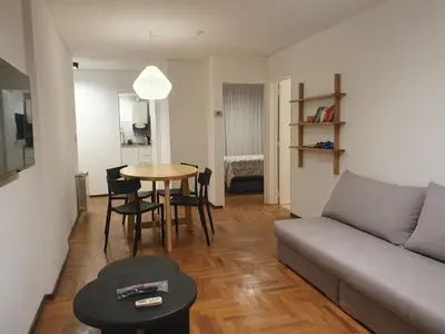 a living room with a couch and a table at Locador Nueva Cordoba 5A in Cordoba