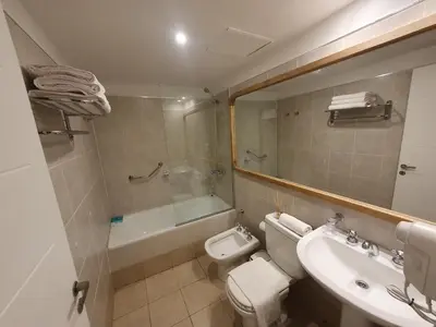 a bathroom with a sink and a toilet and a tub at Locador Nueva Cordoba 5A in Cordoba