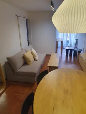 a living room with a couch and a table at Locador Nueva Cordoba 5A in Cordoba