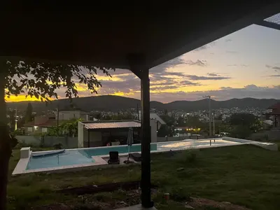 a view of a swimming pool from a house at Lago de montaña in Villa Carlos Paz