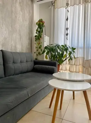 a living room with a couch and a table at Departamento Matilda - B Gral Paz Cba in Cordoba