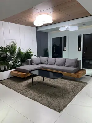 a living room with a couch and a coffee table at Premium tower apart Parking gratis in Cordoba