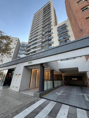 a large building with a sign on the front of it at Premium tower apart Parking gratis in Cordoba